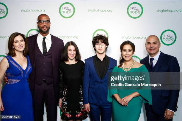 Camille Zamora, Andre Brown, Monica Yunus with Lukas Barwinski-Brown during the Sing for Hope Gala 2017 at Tribeca Rooftop on October 16, 2017 in New...