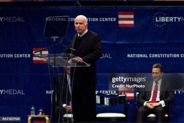 Senator John McCain receives the 2017 Liberty Medal out of hands of former VP Joe Biden, during October 16, 2017 a ceremony at the Constitution...