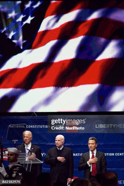 Senator John McCain receives the 2017 Liberty Medal out of hands of former VP Joe Biden, during October 16, 2017 a ceremony at the Constitution...