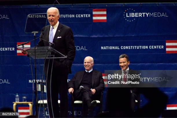 Senator John McCain receives the 2017 Liberty Medal out of hands of former VP Joe Biden, during October 16, 2017 a ceremony at the Constitution...