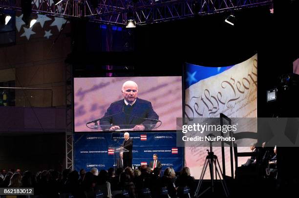 Senator John McCain receives the 2017 Liberty Medal out of hands of former VP Joe Biden, during October 16, 2017 a ceremony at the Constitution...