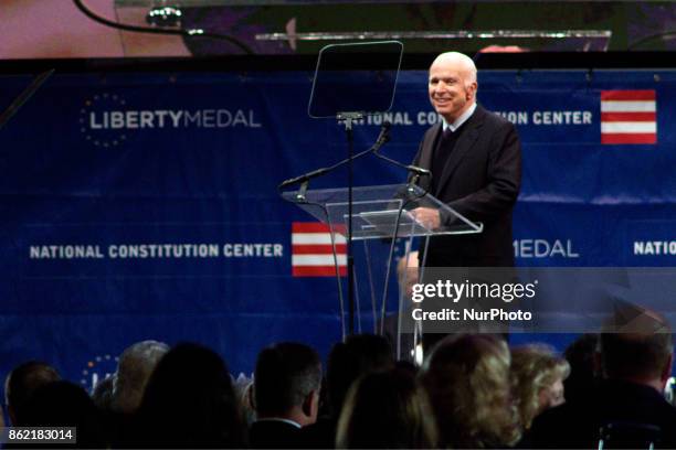 Senator John McCain receives the 2017 Liberty Medal out of hands of former VP Joe Biden, during October 16, 2017 a ceremony at the Constitution...