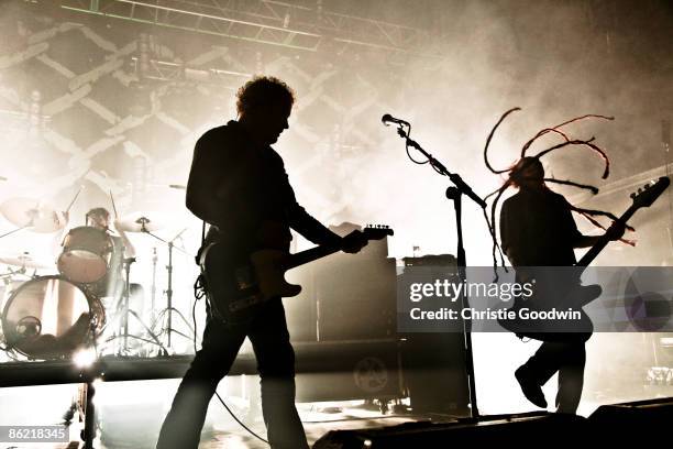 Mark Chadwick and Jeremy Cunningham of the Levellers perform on stage at the Forum on April 25, 2009 in London, England.