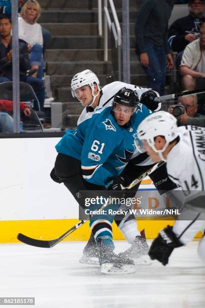 Justin Braun of the San Jose Sharks and Nic Dowd of the Los Angeles Kings look at SAP Center on October 7, 2017 in San Jose, California.