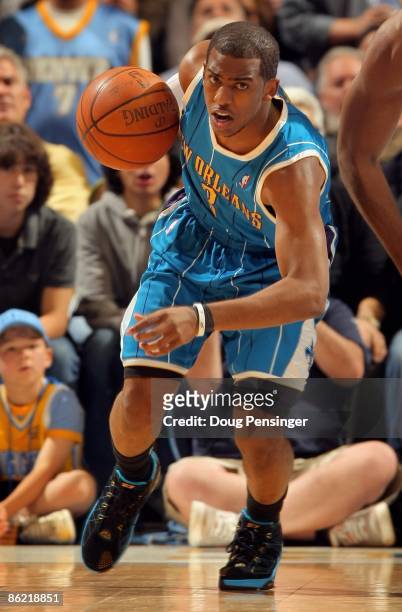 Chris Paul of the New Orleans Hornets controls the ball against the Denver Nuggets in Game One of the Western Conference Quarterfinals during the...