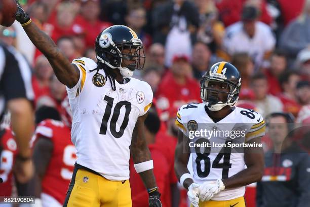 Pittsburgh Steelers wide receiver Martavis Bryant and Antonio Brown after Bryant's 20-yard reception in the second quarter of a week 6 NFL game...