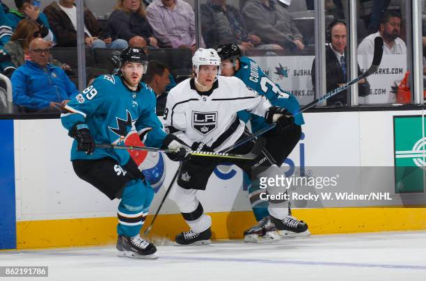 Mikkel Boedker of the San Jose Sharks and Adrian Kempe of the Los Angeles Kings look at SAP Center on October 7, 2017 in San Jose, California.