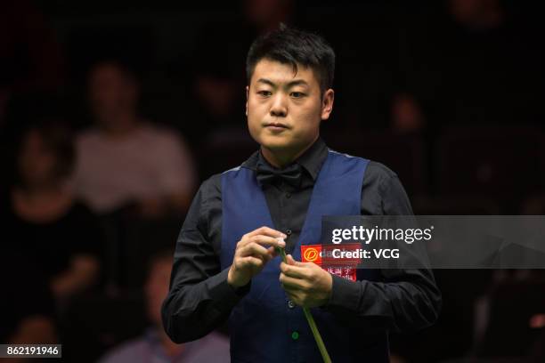 Liang Wenbo of China reacts during his first round match against Duane Jones of Wales on day one of 2017 Dafabet English Open at Barnsley Metrodome...