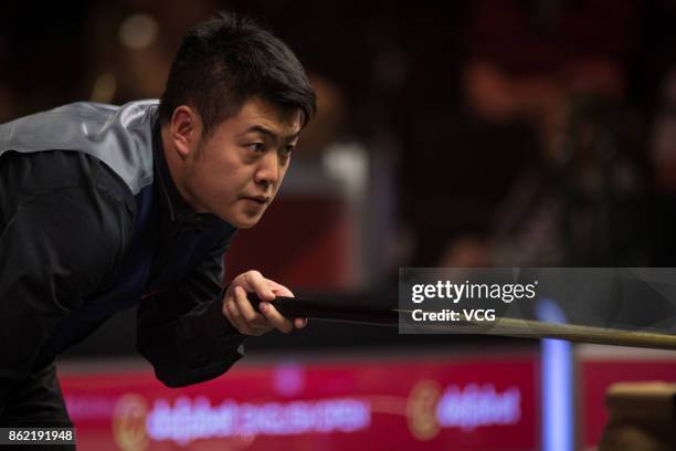 Liang Wenbo of China reacts during his first round match against Duane Jones of Wales on day one of 2017 Dafabet English Open at Barnsley Metrodome...