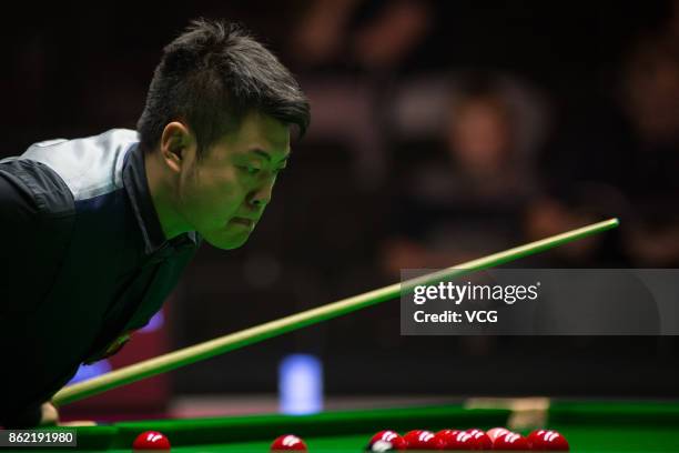 Liang Wenbo of China reacts during his first round match against Duane Jones of Wales on day one of 2017 Dafabet English Open at Barnsley Metrodome...