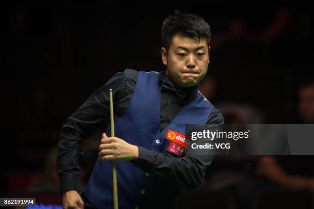 Liang Wenbo of China reacts during his first round match against Duane Jones of Wales on day one of 2017 Dafabet English Open at Barnsley Metrodome...