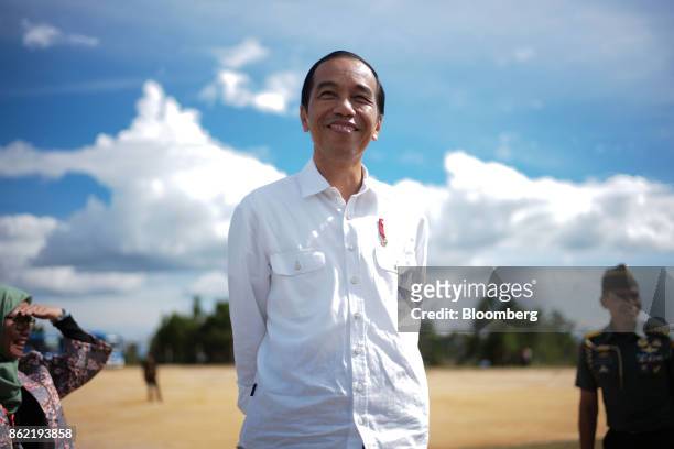 Joko Widodo, Indonesia's president, stands ahead of a Bloomberg Television interview in Silangit, North Sumatra, Indonesia, on Saturday, Oct. 14,...