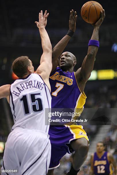 Lamar Odom of the Los Angeles Lakers shoots against Matt Harpring of the Utah Jazz in Game Four of the Western Conference Quarterfinals during the...