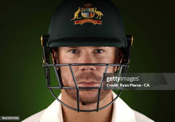 David Warner of Australia poses during the Australia Test cricket team portrait session at Intercontinental Double Bay on October 15, 2017 in Sydney,...