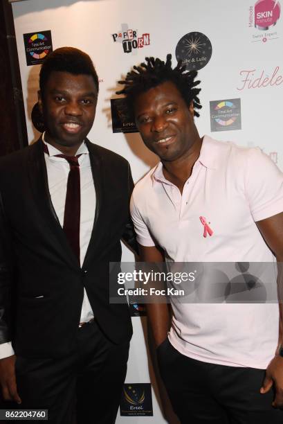 Jean Barthelemy Bokassa and Rost Adom attend the 'Souffle de Violette' Auction Party As part of 'Octobre Rose' Hosted by Ereel at Fidele Club on...