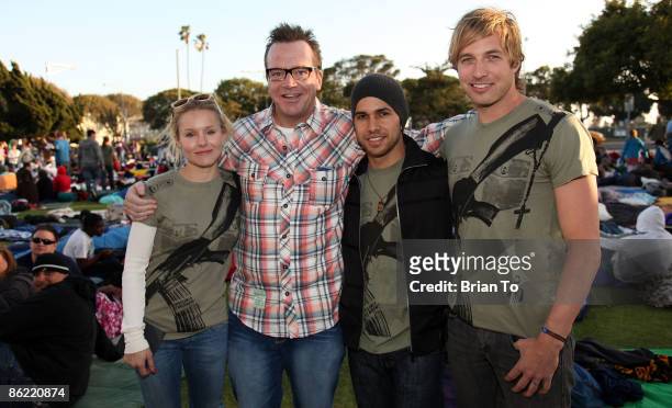 Actors Kristen Bell , Tom Arnold, Walter Perez, and Ryan Hansen attend Invisible Children's "The Rescue" Rally at Santa Monica City Hall on April 25,...