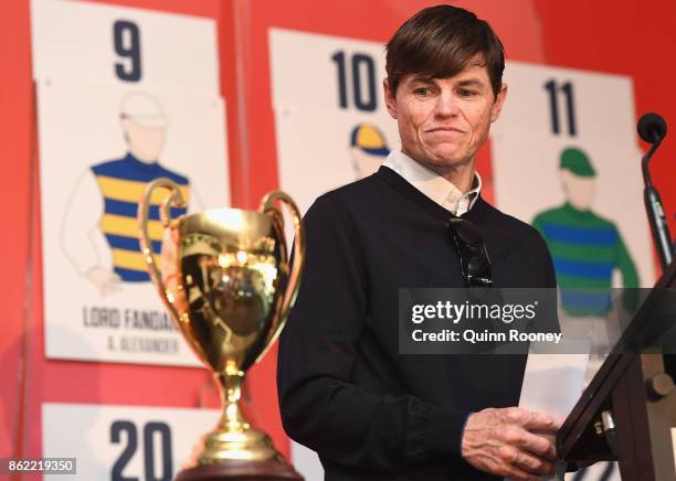 Jockey Craig Williams looks at the Caulfield Cup during the Caulfield Cup Barrier Draw at Caulfield Racecourse on October 17, 2017 in Melbourne,...