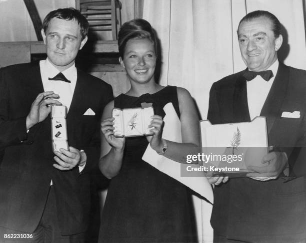 The winners collect their awards at the Cannes Film Festival in France, 24th May 1963. From left to right, Irish actor Richard Harris wins Best Actor...