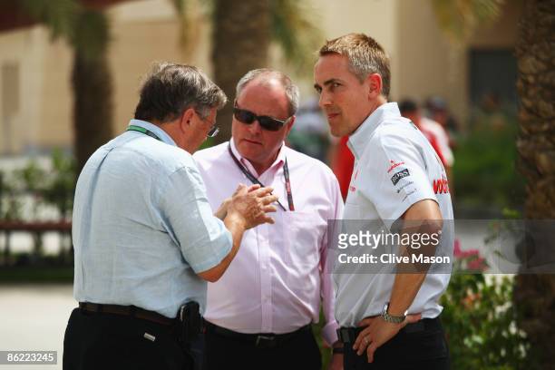 Richard Lapthorne, Group Chairman of the McLaren Group, Alan Donnelly of the F.I.A. And McLaren Mercedes Team Principal Martin Whitmarsh talk in the...