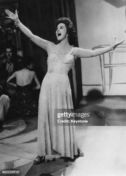 American actress Susan Hayward in a scene from 'I'll Cry Tomorrow', a biopic of Broadway singer Lillian Roth, 1955.