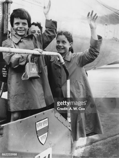 Yasmin and Rebecca, the daughters of American actress Rita Hayworth, leave London Airport for Nice in France, at the end of their first visit to the...