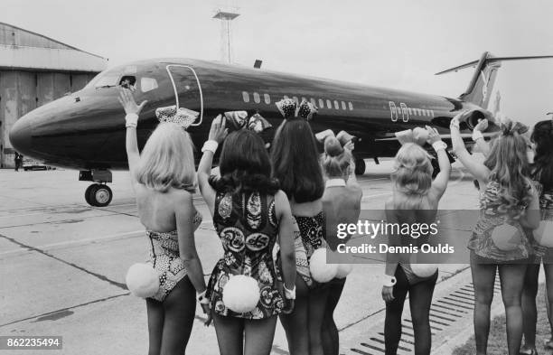 American publisher Hugh Hefner arrives at London Airport in his private DC-9 jet airliner 'Big Bunny', and is met by an entourage of Playboy Bunnies...