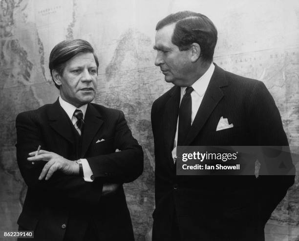 British Labour politician Denis Healey , the Secretary of State for Defence, meets Helmut Schmidt , the West German Defence Minister at the Ministry...