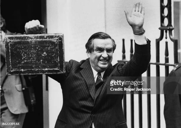 British politician Denis Healey , the Chancellor of the Exchequer, leaves 11 Downing Street for the House of Commons, on Budget Day, London, 15th...