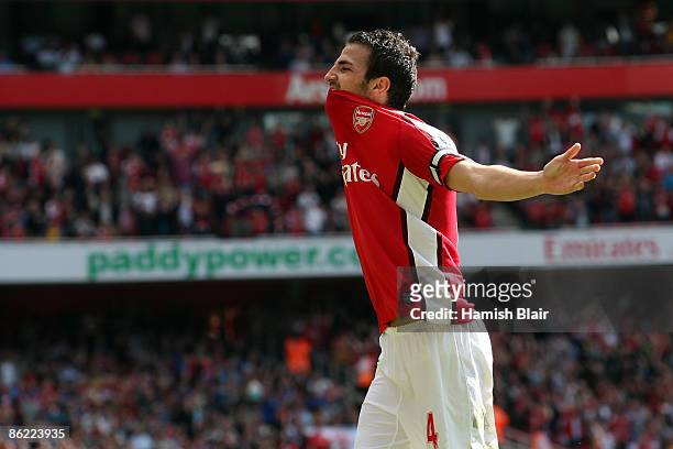 Cesc Fabregas of Arsenal celebrates scoring the second goal during the Barclays Premier League match between Arsenal and Middlesbrough at Emirates...