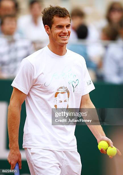 Andy Murray of Great Britain smiles during a charity match with Simone Bolelli of Italy in memory of Federico Luzzi of Italy who died of leukemia...
