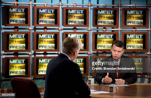 David Gregory listens to King Abdullah II of Jordan speak during a pre-taping of "Meet the Press" at NBC April 24, 2009 in Washington, DC. King...