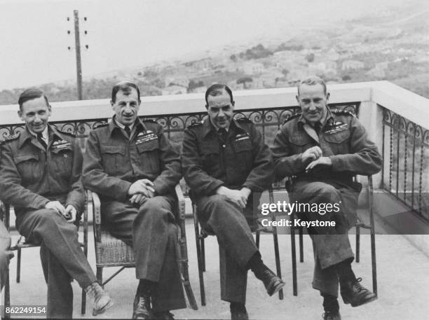 Chiefs meet for a conference in Italy during World War II, late 1943. From left to right, Air Chief Marshal Sir Arthur Tedder, Air Officer...