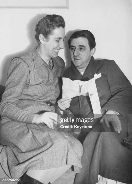 British conductor and cellist John Barbirolli with his wife, oboist Evelyn Barbirolli , nee Rothwell, 29th November 1948.