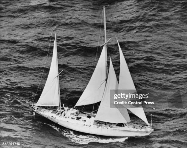 Sir Francis Chichester waves from the deck of the 'Gipsy Moth IV', as he nears the end of his single-handed voyage around the globe, 25th May 1967....