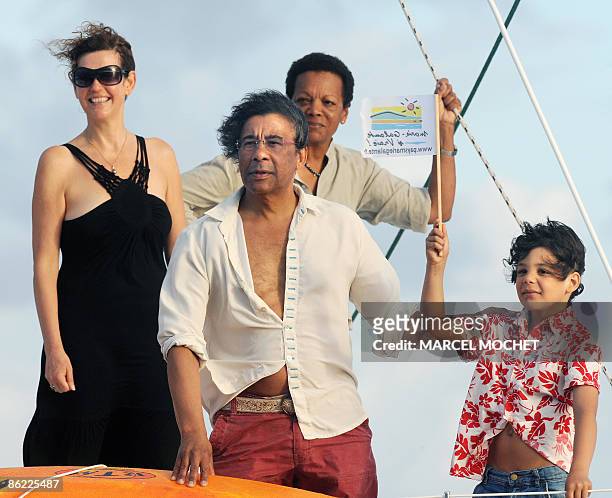 French singer Laurent Voulzy , his son Quentin , his wife Mirella and the widow of French skipper Eric Tabarly, Jacqueline welcome French skipper...