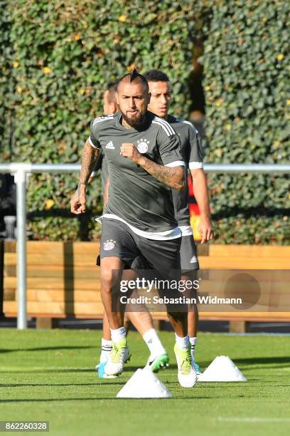 Arturo Vidal of FC Bayern Muenchen runs during a Bayern Muenchen training session ahead of the UEFA Champions League Group B match against Celtic FC...