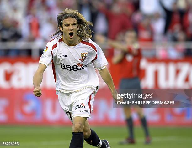 Sevilla's midfielder Diego Capel celebrates after scoring during the Spanish League football match against Real Madrid at the Sanchez Pizjuan stadium...
