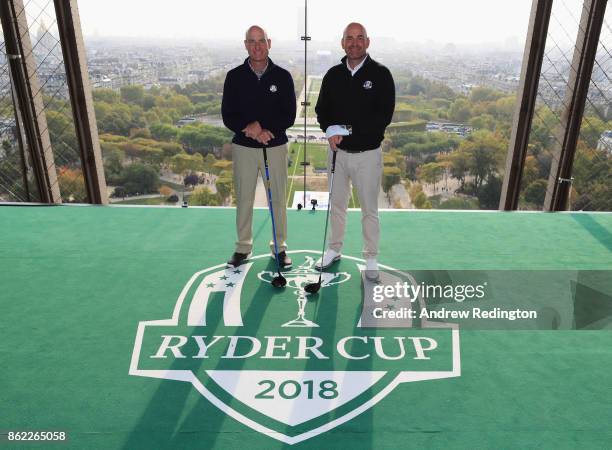 Jim Furyk, Captain of The United States and Thomas Bjorn, Captain of Europe pose on a platform on the Eiffel Tower during the Ryder Cup 2018 Eiffel...