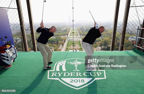 Jim Furyk, Captain of The United States and Thomas Bjorn, Captain of Europe tee off from a platform on the Eiffel Tower during the Ryder Cup 2018...