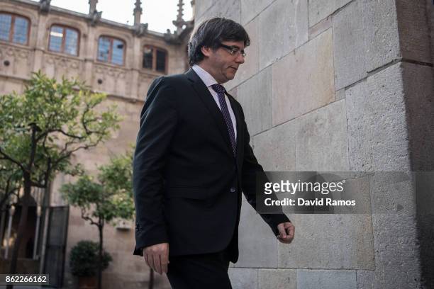 President of Catalonia, Carles Puigdemont, arrives at a government meeting at the Palau de la Generalitat building on October 17, 2017 in Barcelona,...