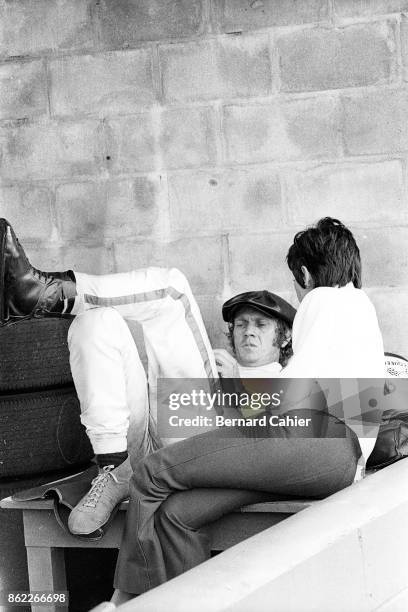 Steve McQueen, 12 Hours of Sebring, Sebring, 21 March 1970. Hollywood star Steve McQueen relaxing in the pits during practice for the 1970 12 Hours...