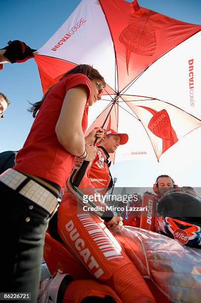 Casey Stoner of Australia and Ducati Malboro Team and hif wife Adriana waiting on the grid before the 250cc race of the MotoGP World Championship...