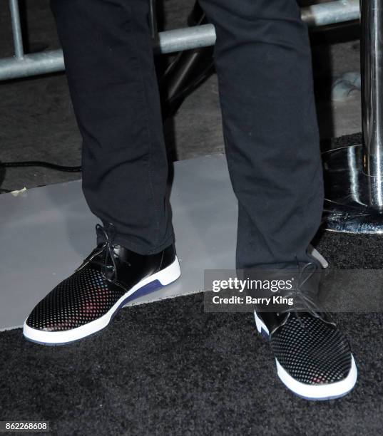 Actor John Brotherton, shoe detail, attends the premiere of Warner Bros. Pictures' 'Geostorm' at TCL Chinese Theatre on October 16, 2017 in...