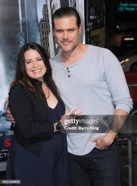 Actress Holly Marie Combs and fiance Mike attend the premiere of Warner Bros. Pictures' 'Geostorm' at TCL Chinese Theatre on October 16, 2017 in...