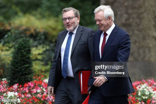 David Mundell, U.K. Scottish secretary, left, and David Davis, U.K. Exiting the European Union secretary, arrive for a cabinet meeting at number 10...