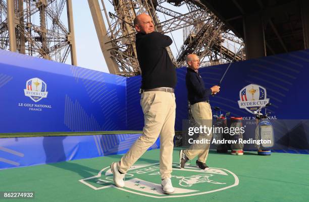 Jim Furyk, Captain of The United States and Thomas Bjorn, Captain of Europe tee off from a platform on the Eiffel Tower during the Ryder Cup 2018...