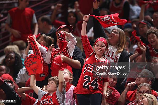 Chicago Bulls fan waves a towel in the second overtime of the game between the Boston Celtics and the Chicago Bulls in Game Four of the Eastern...