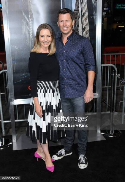Actress Beverley Mitchell and husband Michael Cameron attend the premiere of Warner Bros. Pictures' 'Geostorm' at TCL Chinese Theatre on October 16,...