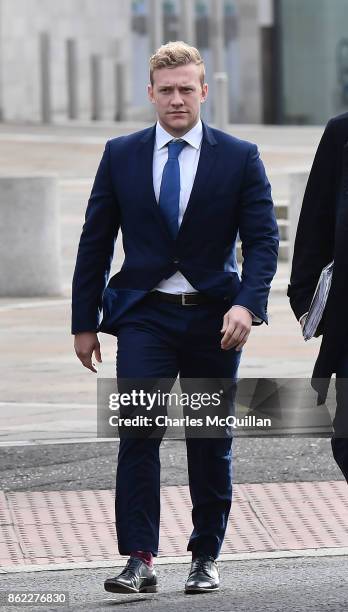 Ireland and Ulster rugby player Stuart Olding arrives at court with his legal advisors at Belfast Magistrates Court relating to a rape charge hearing...