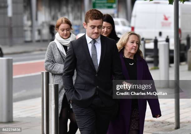 Ireland and Ulster rugby player Paddy Jackson arrives at court with family members at Belfast Magistrates Court relating to a rape charge hearing on...